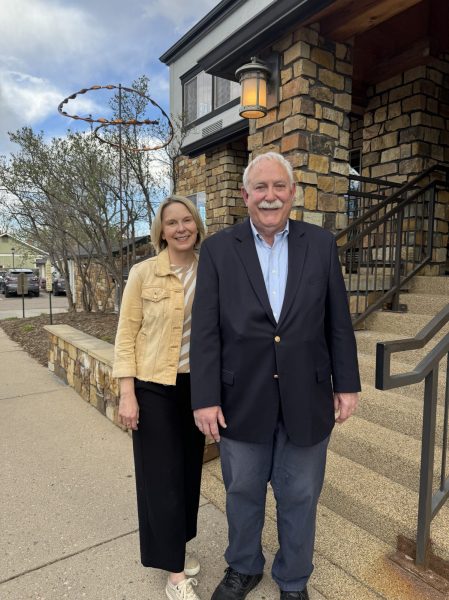 Two people standing outside together. Dr. Carl Burgchardt and Dr. Karin Vasby Anderson