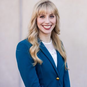 Headshot of Leslie Schenk who graduate from the Communication Studies Department in 2021. She is now a Deputy District Attorney for the City and County of Denver.