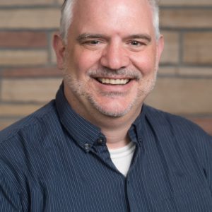 Head shot of Professor Martin Carcasson from the Department of Communication Studies. Carcasson is the director the Center for Public Deliberation. 