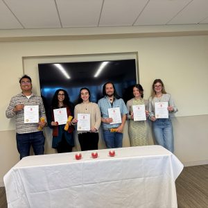 Students holding certificates